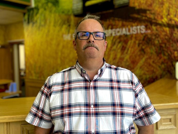 Kris Hand in checked shirt, glasses and a moustache, rejoins Roger Bullivant’s South Central residential team as operations manager, focusing on standardising practice, safety and skills development.