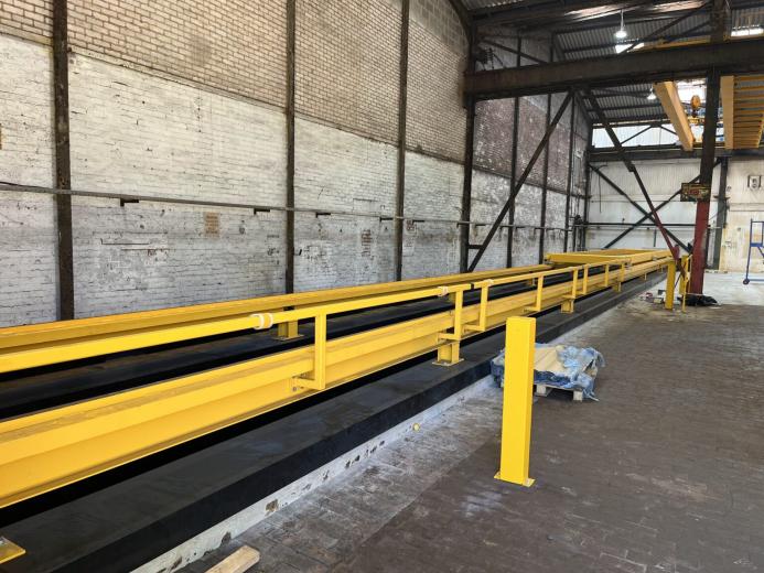 Yellow steel girders in a factory