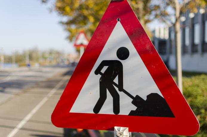 A men at work sign