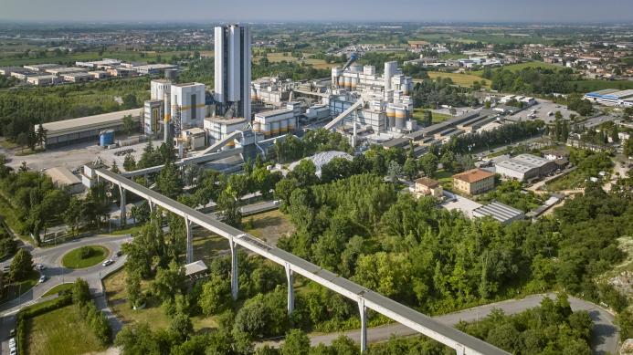 An aerial view of Heidelberg Materials' cement plant in Rezzato-Mazzano, Italy, surrounded by countryside