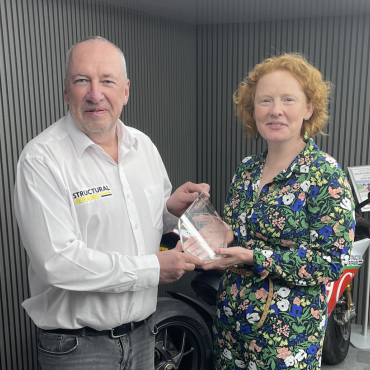 Roger Line of Structural Repairs receives the New Product Award from Concrete Connect editor, Clare Howcutt-Kelly.