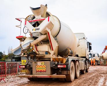 A truck mixer delivers concrete to HS2