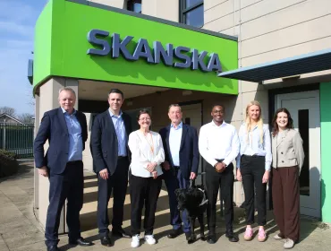 (L-R) Gracie Bocking, trainee civil engineer; Ronald Kiweewa, trainee civil engineer; Lord Blunkett; Katy Dowding, president and CEO Skanska UK; Andy Entwistle, managing director Cementation Skanska.