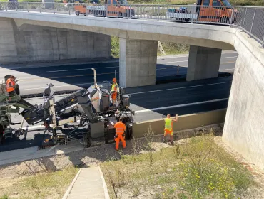Wirtgen's SP 33 slipform paver, unveiled at World of Concrete 2025 (21-23 Jan), Las Vegas, US, before getting its European debut at this year's bauma (7-13 Apr) in Munich, Germany, working under a concrete bridge on a motorway.