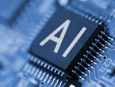 An AI labelled electronic component mounted on a circuit board