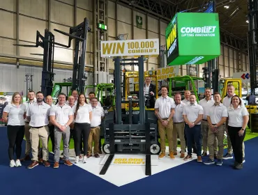 Combilift staff celebrate The 100,000th Combilift forklift, a golden Combi-CBE, was unveiled at IMHX 2025 in Birmingham.