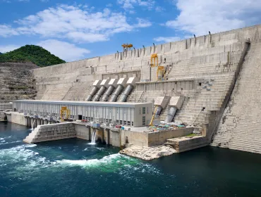 The Grand Ethiopian Renaissance Dam viewed from below and to the right, inaugurated in September 2025, is the largest roller-compacted concrete gravity dam in Africa.