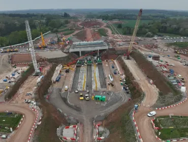 An aerial view of The 14,500-tonne concrete box structure for HS2’s A46 Kenilworth bypass bridge was built offline and slid into place in just 18 days. (Image courtesy HS2 Ltd)