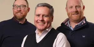 Three smiling men who all work for Oscrete.