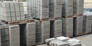 Concrete paving slabs stacked up in a builders yard