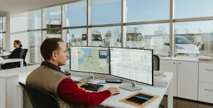 A man sitting in front of a computer