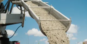 Concrete being unloaded from a concrete mixer