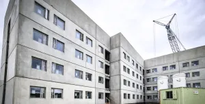 The concrete facade of a building under construction