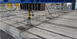 Hollowcore concrete beams under pressure in a laboratory