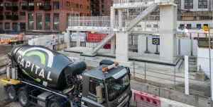 A Capital Concrete mixer delivers concrete to Sisk's Wembley project 