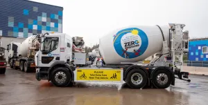 One of six, white concrete mixer trucks, part of Tarmac’s eMixer Discovery Programme which allows supply chain partners to lease an electric mixer for six months to test its performance before committing to long-term investment.