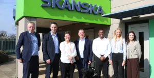 (L-R) Gracie Bocking, trainee civil engineer; Ronald Kiweewa, trainee civil engineer; Lord Blunkett; Katy Dowding, president and CEO Skanska UK; Andy Entwistle, managing director Cementation Skanska.