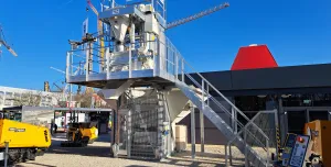 Ammann's new compact Elba CFS (Concrete Filling Station) against a blue sky
