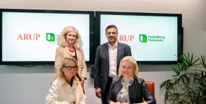 Signing the Memorandum of Understanding. Seated (left to right): Dame Jo da Silva (chief sustainable development officer, Arup), Dr Katharina Beumelburg (chief sustainability and new technologies officer, Heidelberg Materials); standing behind (left to right): Jemima Bruin-Bland, carbon capture and utilisation lead – UKIMEA, Arup), Mubarik Chowdhry (vice president global key account and product management evoZero, Heidelberg Materials)