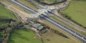 An aerial view of the Marazanvose green bridge spanning the new dual carriageway and old A30.