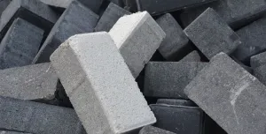 a pile of differently coloured concrete blocks.