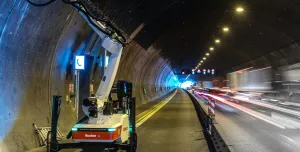 A Baubot robot drilling anchor holes to prepare for reinforced concrete linings in the Engelberg Tunnel, Germany.