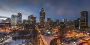 The Montréal towards sunset with a ligh dusting of snow covering the ground