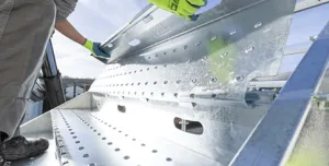 A close up of someone assembling PER UP's new "public stairs", which enable safe, high-footfall access across construction and infrastructure sites.