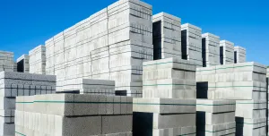 Neat, banded stacks of Cemex’s ReadyBlock Lite concrete blocks, which are designed for easier handling, lower carbon and improved thermal performance.