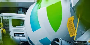 A close up of a Holcim branded cement truck's livery