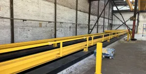 Yellow steel girders in a factory