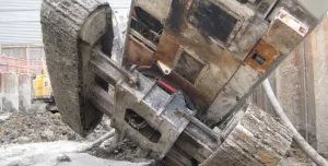 The underside of a toppled, tracked piling rig
