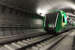 An green, underground train in Melbourne, Australia