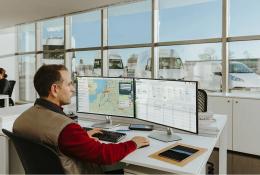A man sitting in front of a computer