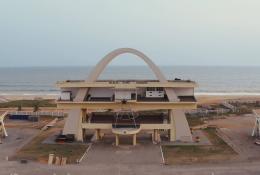 An aerial photo of a modernist concrete building in Africa