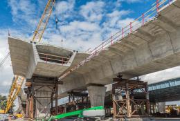 A picture of a concrete bridge under construction