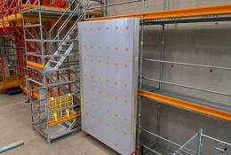 A grey scaffolding cladding panel