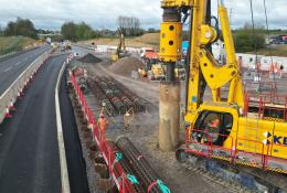A yellow piece of construction equipment sitting roadside