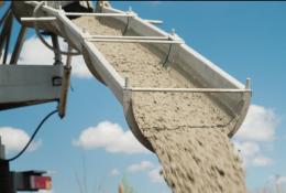 Concrete being unloaded from a concrete mixer