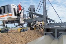 A concrete slipform paver