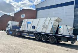 A flat bed lorry transporting an aggregate crusher