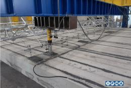 Hollowcore concrete beams under pressure in a laboratory