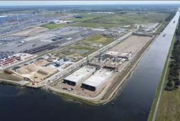 An aerial view of a large industrial dock with construction work taking place