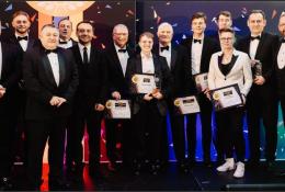 A large group of smiling people in dinner dress, Winners of the FPS Awards 2024