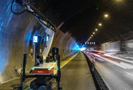 A Baubot robot drilling anchor holes to prepare for reinforced concrete linings in the Engelberg Tunnel, Germany.