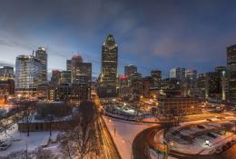 The Montréal towards sunset with a ligh dusting of snow covering the ground