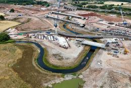 Aerial view of the re-aligned River Cole near Coleshill, showing the new meandering channel created to enable construction of HS2 viaducts at Delta Junction.