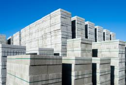 Neat, banded stacks of Cemex’s ReadyBlock Lite concrete blocks, which are designed for easier handling, lower carbon and improved thermal performance.