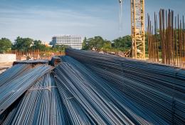 Rebar and a yellow tower crane