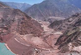An aerial view of the The Rogun Dam in Tajikistan, which is on course to reach 335 m, supported by large-scale embankment, foundation and concrete works.